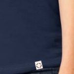Ladies Navy Blue One shirt with woven label close up.